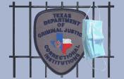 TDCJ Correctional Badge superimposed over prison bars with a disposable medical mask hanging off of the badge.