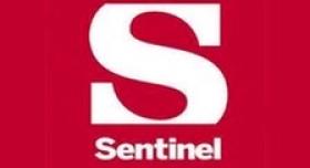 Logo of the Colorado Sentinel. White letter "S" on red background.