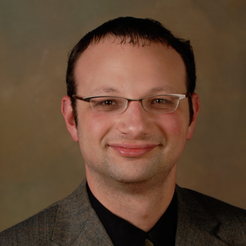 Headshot of Marc Levin. Short black hair and glasses.