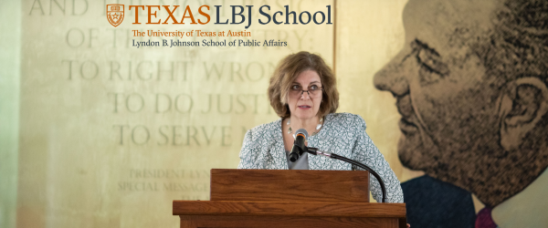 Photo of Michele Deitch speaking at a podium at the LBJ School.