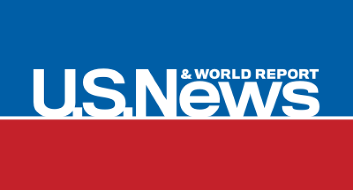 U.S. News logo. White letters on background that is half blue and half red.